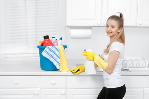 Staff member responding to a cleaning site hazard with caution
